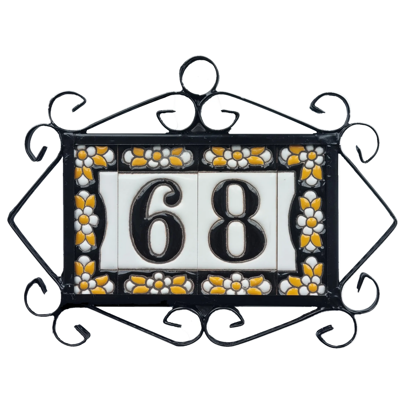 Decorative house number sign with '68' in a floral frame on a white background